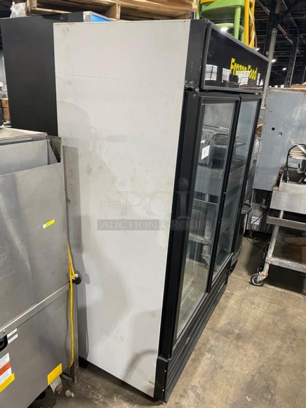 True GDM-49F commercial black double glass swing door freezer, poly-coated wire rack, 115/208/230V, pre-owned condition.