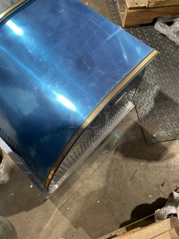 Diamond GVRB120 sushi display case with curved glass, stainless steel, new condition, rear sliding doors, 49 inches, 110V.