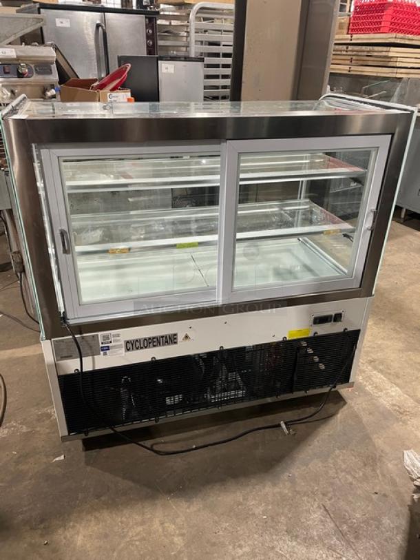 Avantco commercial 48" bakery display case with curved glass, adjustable shelving, rear sliding doors. Model 193BC48HCW.