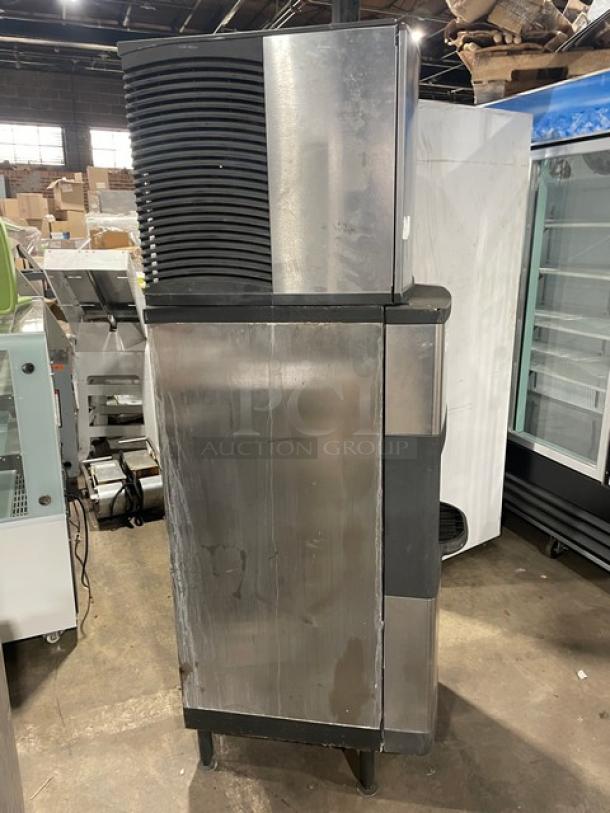 Manitowoc stainless steel ice maker model SD0423W/QPA160, water-cooled, electric, on legs, used condition.