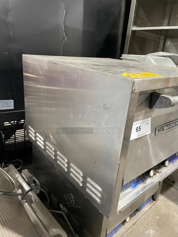 Bakers Pride P18 stainless steel electric countertop pizza oven, single chamber, double deck, 120V, visible wear, model tag.