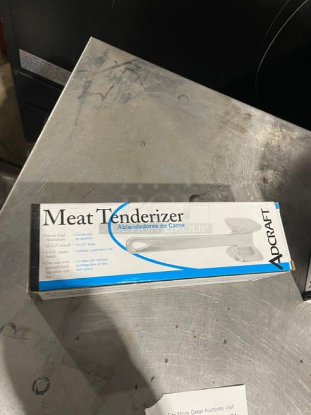 Adcraft MTA10 Commercial Aluminum Meat Tenderizer in box. New condition, 2-3/4" square head. Packaging highlights durability.
