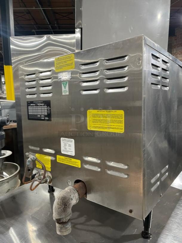 Cleveland Range 21CET8 commercial stainless steel 3-pan convection steamer. Features built-in pan holding rack, model and safety labels.