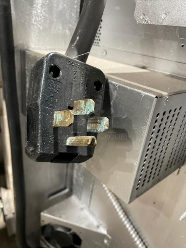 Blodgett commercial stainless steel convection oven, single stack, electric powered, with thermostatic control and wired rack.