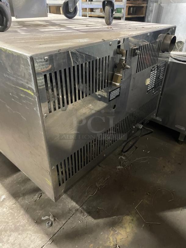 Euroven Commercial Stainless Steel Combi Oven, Model US04UNO2, 208/240V, 3 Phase, on legs. Visible wear, labels intact.