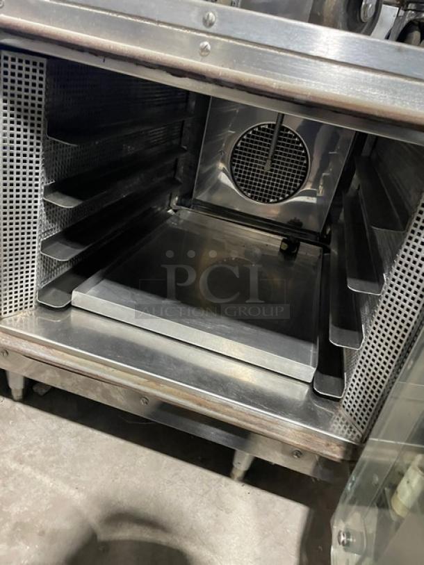 Euroven US04UNO2 stainless steel electric combi oven, interior view, excellent condition, 208/240V 3-phase, on legs.