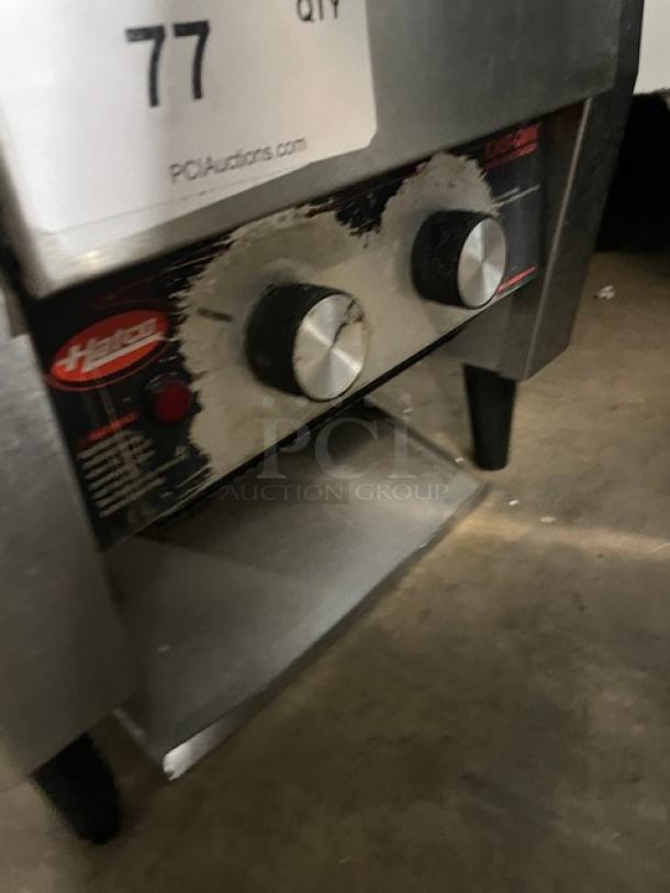 Hatco Toast-Qwik TQ-20BA Commercial Conveyor Toaster, stainless steel, electric, 208V 1 Phase, on legs, model and control panel visible.