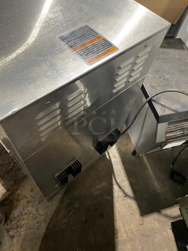 Bunn DUALSHDBC commercial stainless steel dual coffee brewer with hot water dispenser, digital control, on legs, 120/208V.