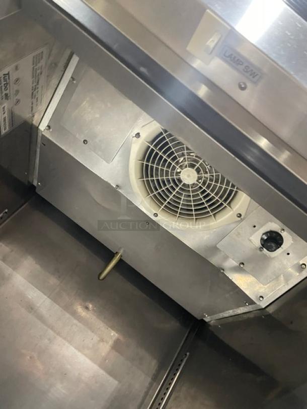 Turbo Air TSR-23D stainless steel single door refrigerator interior showing fan and metal finish, 115V, SN: RN01623104.