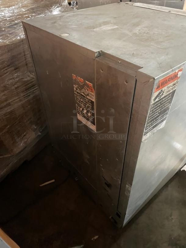 Sub-Zero 424 stainless steel wine cooler, single glass door, dual zone, 115V, visible wear, warning labels on side.