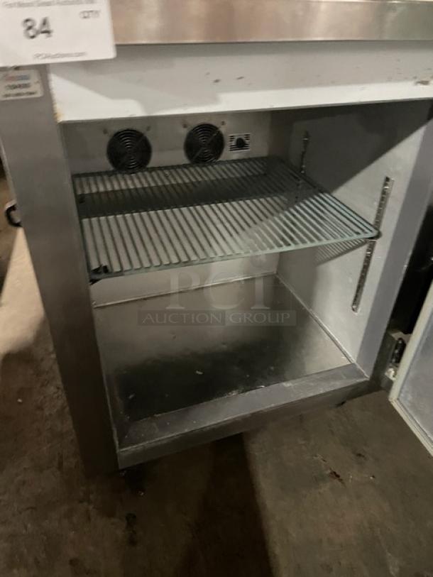 Leader NSFB27SC undercounter fridge with poly-coated wire rack, single stainless steel door, 115V, on legs. SN: NK041096.