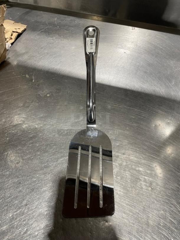 NEW Adcraft Commercial 6" Slotted Stainless Steel Kitchen Turner, Model SL80, pristine condition, visible label on handle.