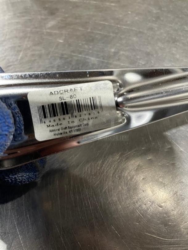 NEW Adcraft SL-80 stainless steel slotted kitchen turner, 6 inches, commercial quality. Label shows model and origin.