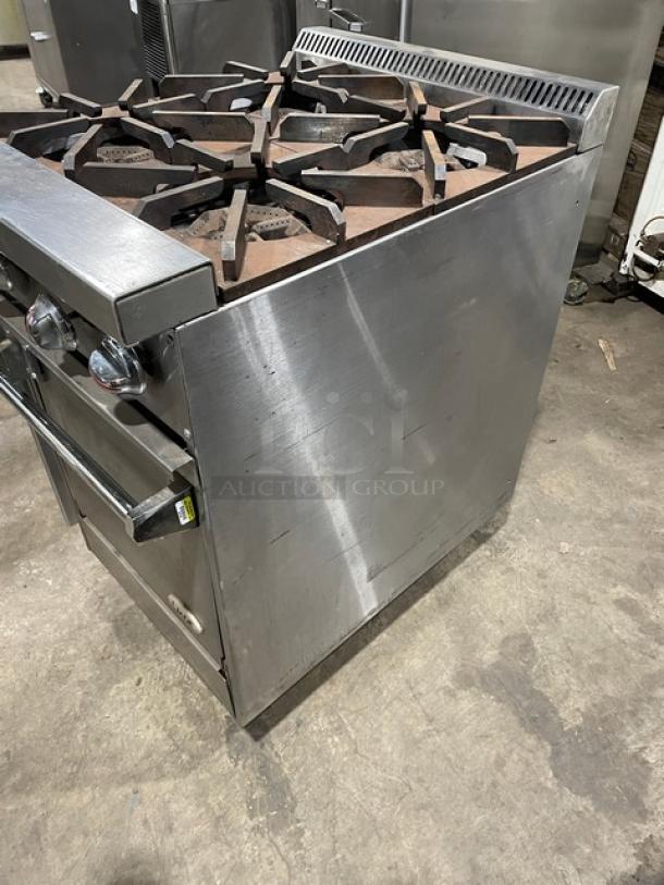 Jade Range Model JBR424 commercial stainless steel 4-burner gas range with oven, wired rack, and legs. Serial: 0000048816VL.