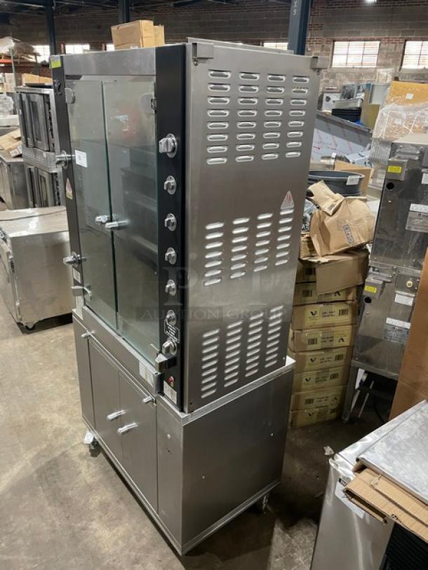Rotisol 9505 rotisserie oven, stainless steel, natural gas, tempered glass doors, enclosed cabinet base, retractable workstation, on casters.