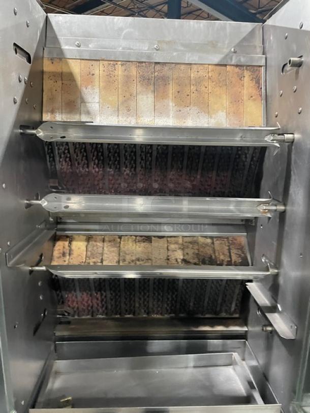 Rotisol 9505 rotisserie oven with stainless steel interior, three racks, natural gas powered, enclosed cabinet base, model 950.5 SN: 3798.