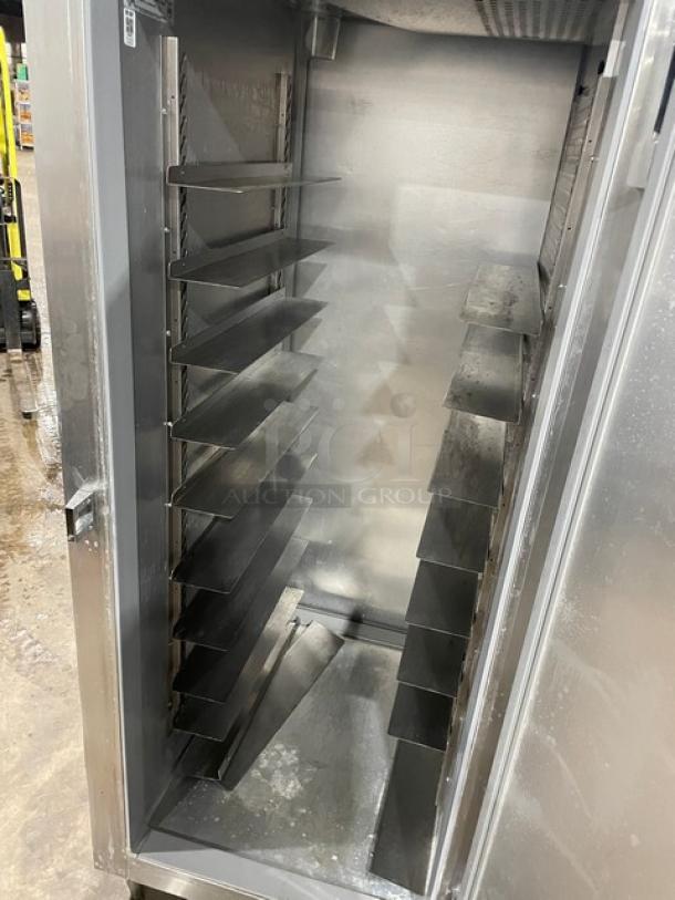 Continental Commercial Stainless Steel Pass-Thru Refrigerator, Model DL1RE-PT, built-in pan slide, single door, on legs.