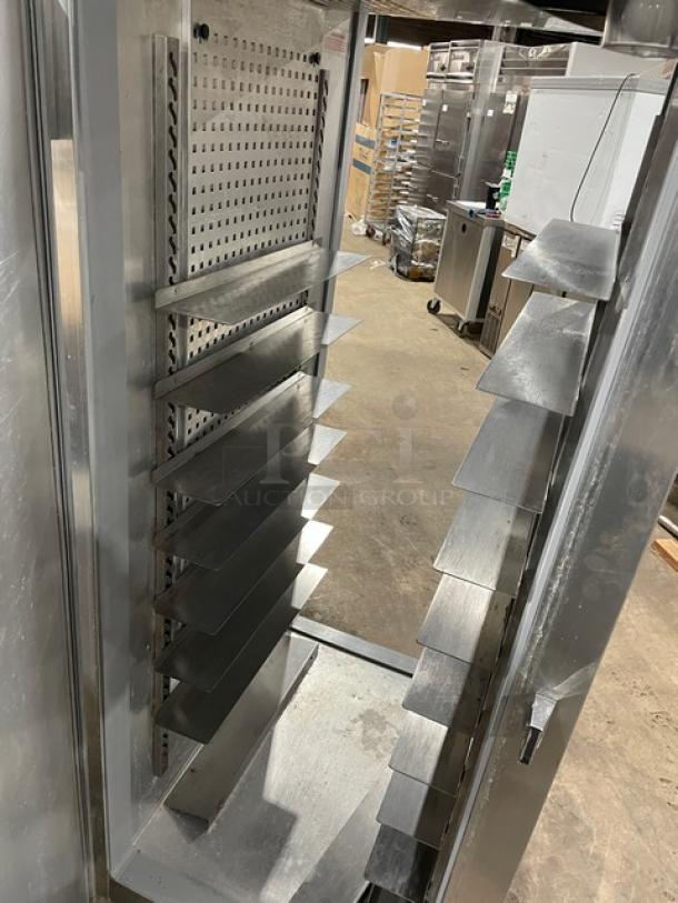 Continental stainless steel single door reach-in refrigerator, model DL1RE-PT, with built-in pan slide, on legs.