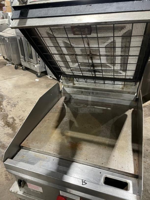 Lang 224TH-NATMG stainless steel infrared clamshell griddle with stand, natural gas, on casters. Used condition.