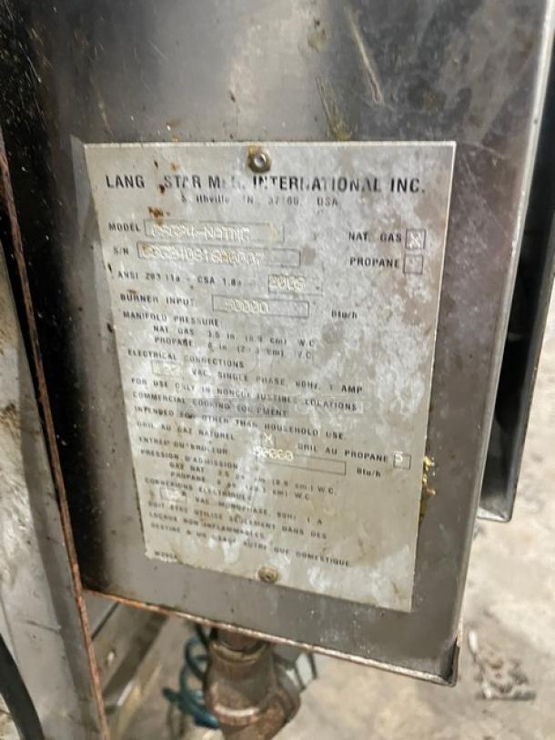 Lang 224TH-NATMG commercial stainless steel natural gas clamshell griddle. Tag shows model, serial number, and gas type.