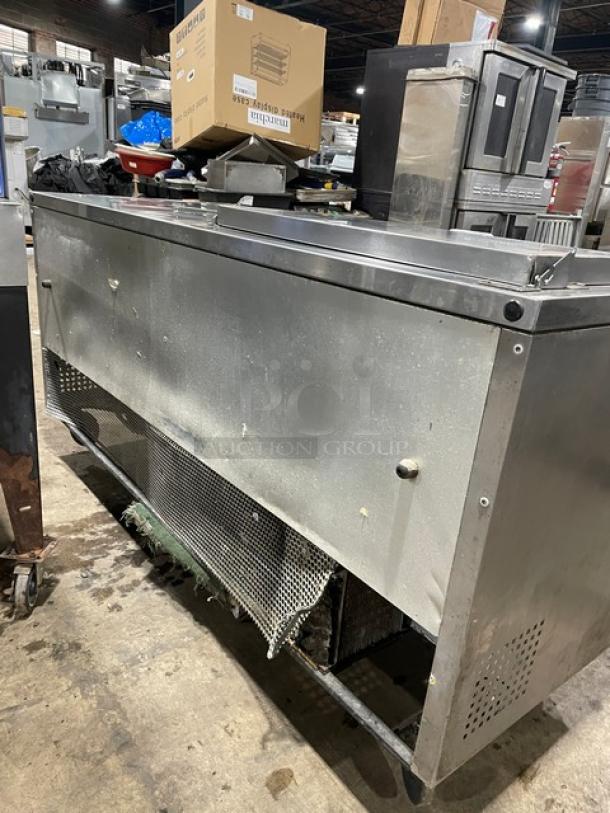 True TSSU-72-08 3-door stainless steel refrigerated prep table, 72", poly coated rack, used condition.