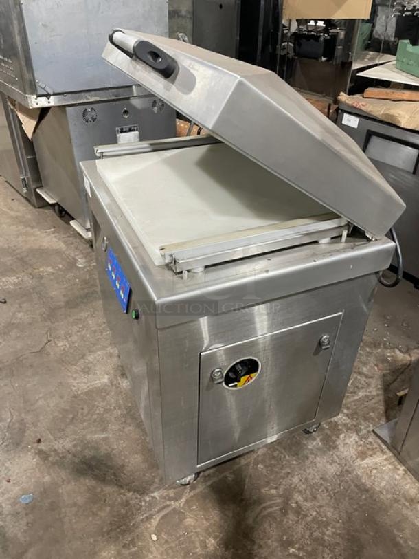 Promax stainless steel vacuum tray sealer, electric-powered, digital controls, on casters, working condition.
