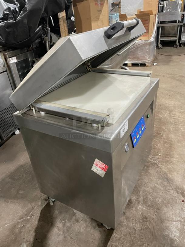 Promax stainless steel single chamber vacuum tray sealer with digital controls, on casters, in used condition.