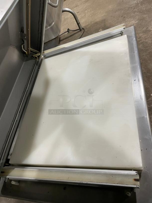 Promax stainless steel vacuum tray sealer with digital controls, single chamber, on casters. Good condition.