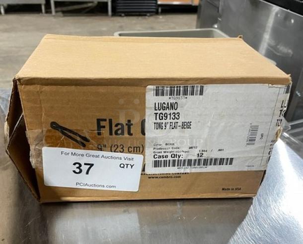 Cambro Commercial Beige 9" Flat Serving Tongs, Model TG9133, new in box with labels indicating product details.