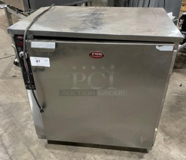FWE stainless steel countertop heated holding cabinet, model HLC-SL1826-8-CHP, electric, with wired racks, on casters.