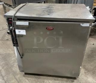 FWE stainless steel countertop heated holding cabinet, model HLC-SL1826-8-CHP, electric, with wired racks, on casters.