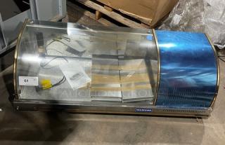 New Diamond GVRB120 stainless steel sushi display case, 49" curved glass, rear sliding doors, excellent condition.