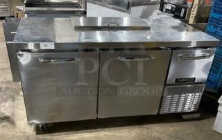 Continental Commercial Stainless Steel Prep Table, Model RA68NB, 2-1/2 doors, poly-coated rack, 115V, on casters, used condition.