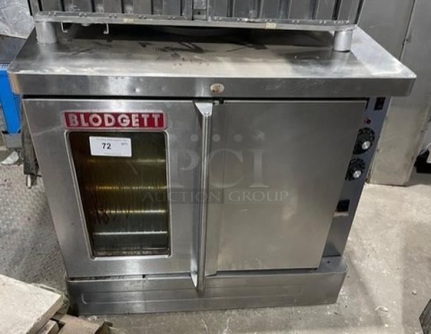 Blodgett commercial stainless steel single stack convection oven, electric powered, with thermostatic control and wired rack.