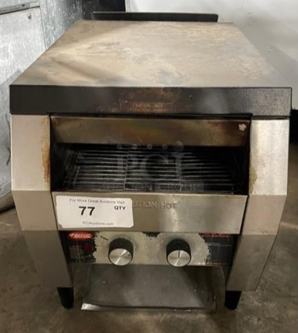 Hatco Toast-Qwik TQ-20BA commercial conveyor toaster, stainless steel, electric, 208V, on legs, used condition, model label visible.
