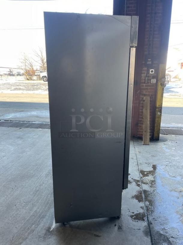 Beverage-Air stainless steel 2-door reach-in freezer, Model KF48-1AS, side view, poly coated wire rack, Energy Star certified.