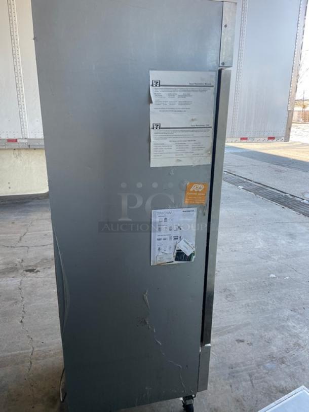 Beverage-Air stainless steel reach-in freezer, model KF24-1AS, Energy Star certified, on casters, with poly-coated wire rack.