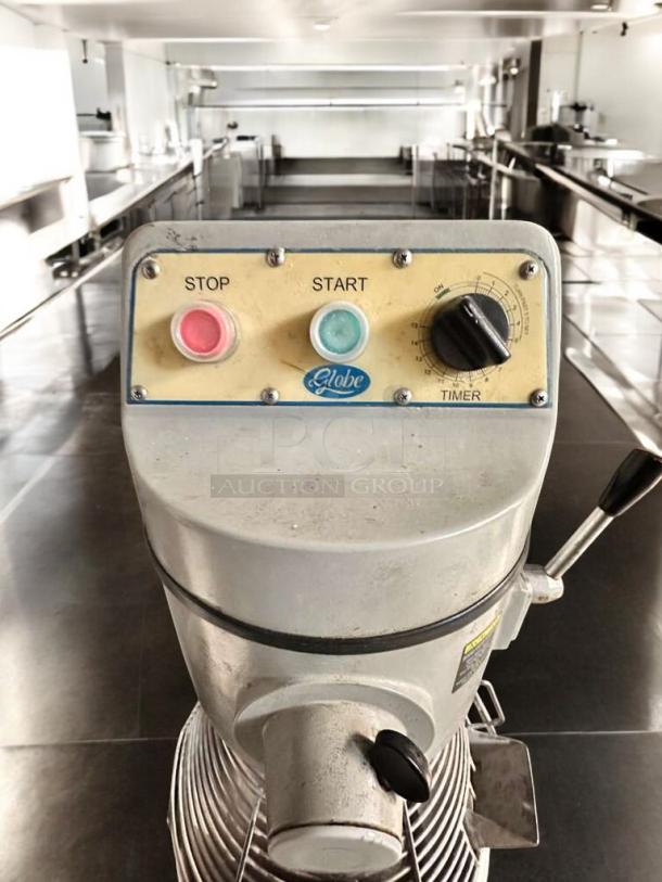 Globe SP40P 40-Qt commercial planetary mixer with control panel. Features start/stop buttons, timer, excellent condition.