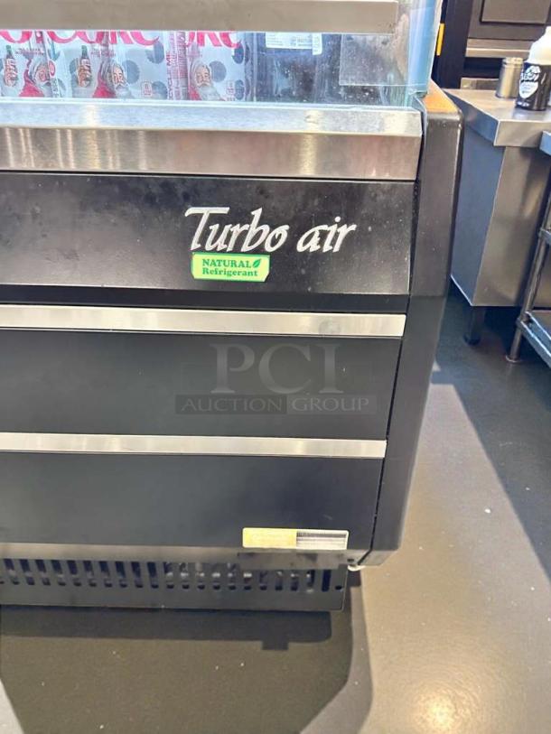 Turbo Air TOM-40B-N display refrigerator, open-front, superb condition, natural refrigerant label, black finish.