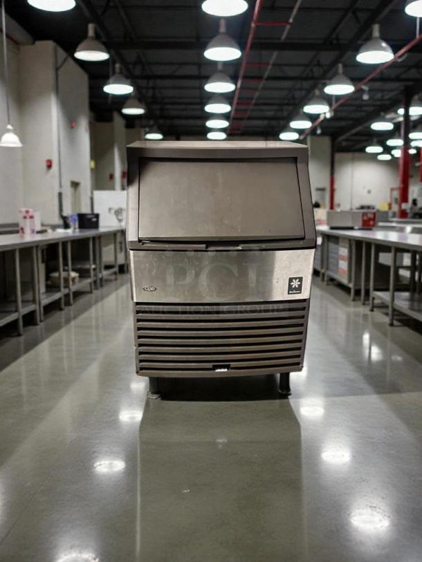 Pristine Manitowoc Q210 ice machine, dice cube type, fully tested, excellent condition, stainless steel finish.