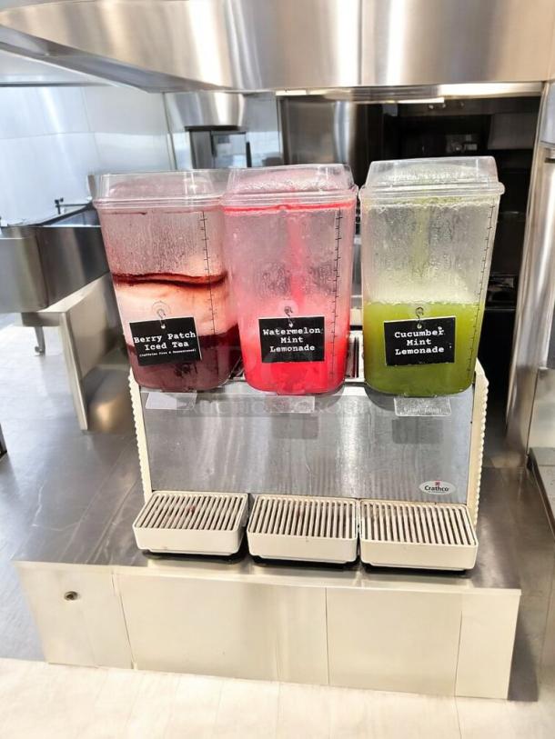 Crathco D35-4 refrigerated beverage dispenser, 4-flavor, excellent condition, labeled containers, model D35-4.