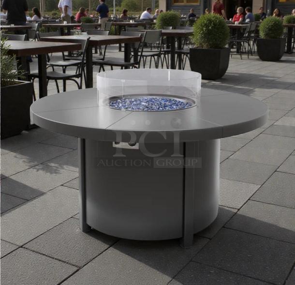 Pristine round gas fire pit table, Outdoor Living, for natural gas/propane. Excellent condition, glass shield, inspected.