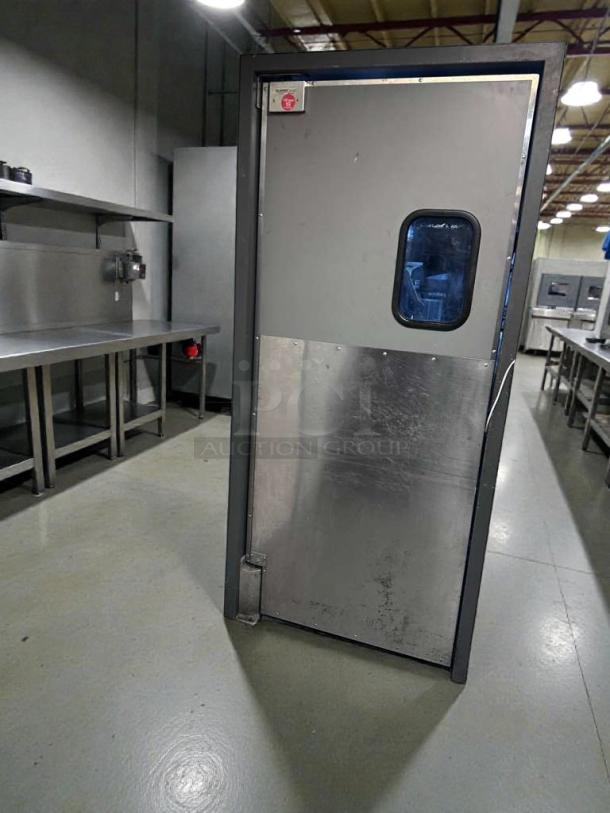 Eliason Hangar 19 commercial walk-in traffic door, stainless steel, outstanding condition, tested and working, with window panel.