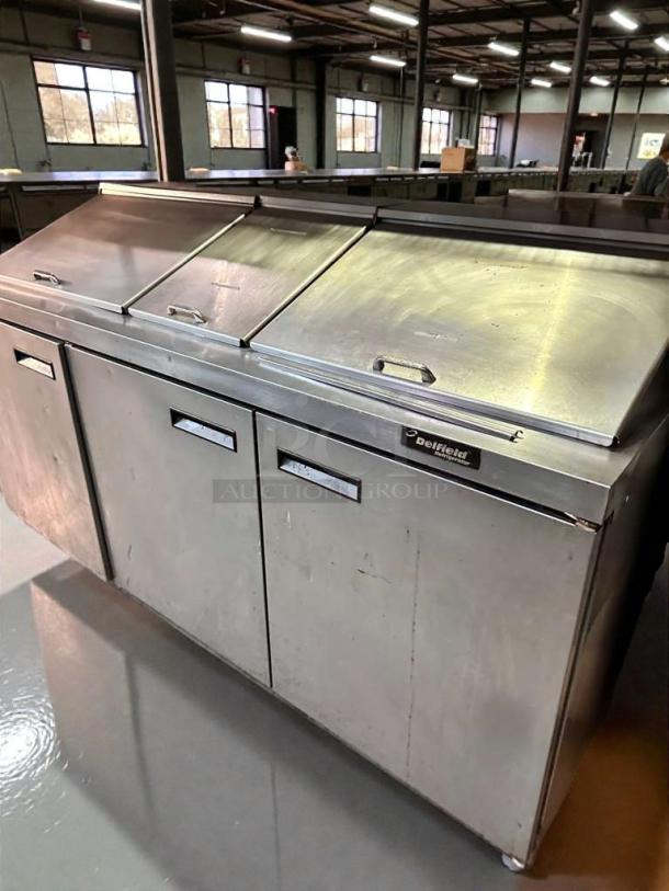 Delfield TSSU-36-08 refrigerated prep table in very good condition, stainless steel, fully tested, 115V, commercial use.