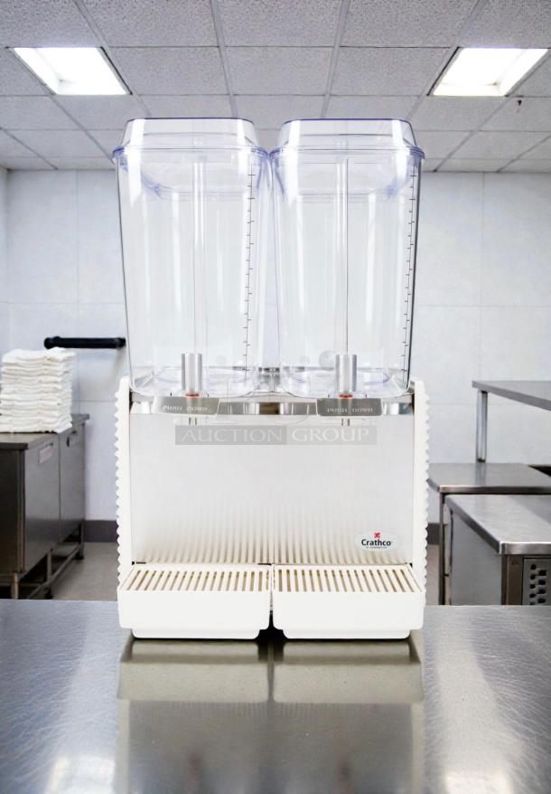 Crathco D25-4 Dual Beverage Dispenser in outstanding condition; 115V, fully tested and working, clear containers, Crathco branding.