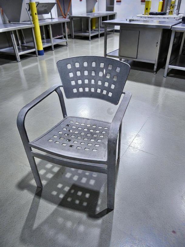 Set of 6 metal patio arm chairs in outstanding condition, heavy-duty design, inspected and ready for outdoor use.