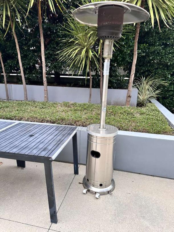 Stainless steel commercial outdoor patio heater, mushroom-top, superior condition, tested, ready to use. Quantity: 4.