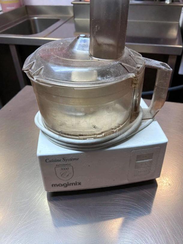 Magimix Cuisine Système 3000 food processor, excellent condition, 120V, fully tested. Markings show model and brand.