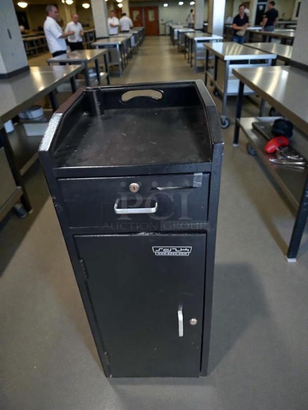 Pristine black restaurant service station cabinet with lockable drawer and door, metal construction, fully tested.
