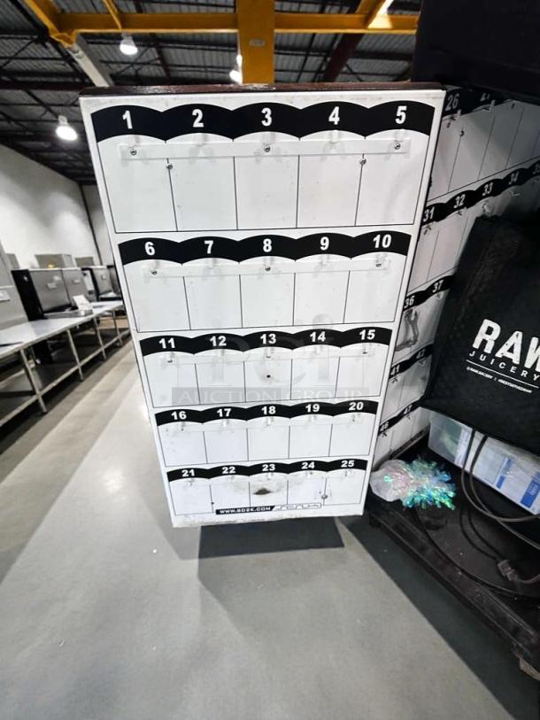 Pristine black restaurant service station cabinet with organized slots, fully tested and ready for use.